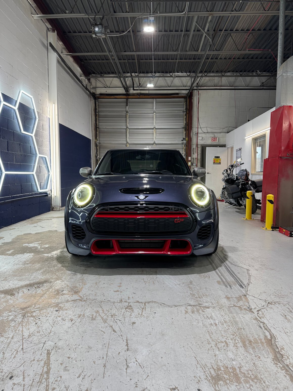 t is equipped with an 8-speed automatic transmission and front-wheel drive. This model has a unique exterior design, including a multi-level rear wing, carbon-fiber fender add-ons, and red accents